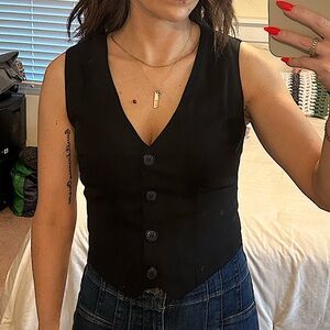 Black button up vest